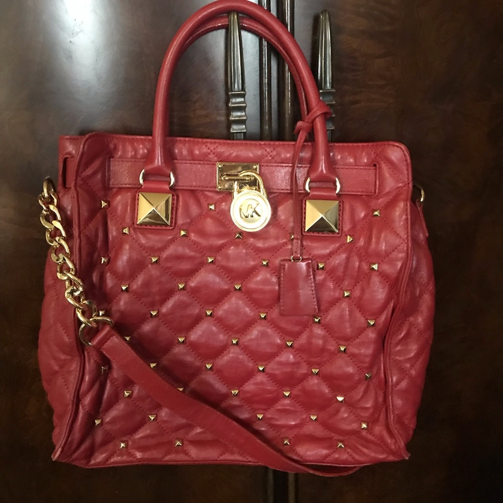 Michael Kors red leather purse.